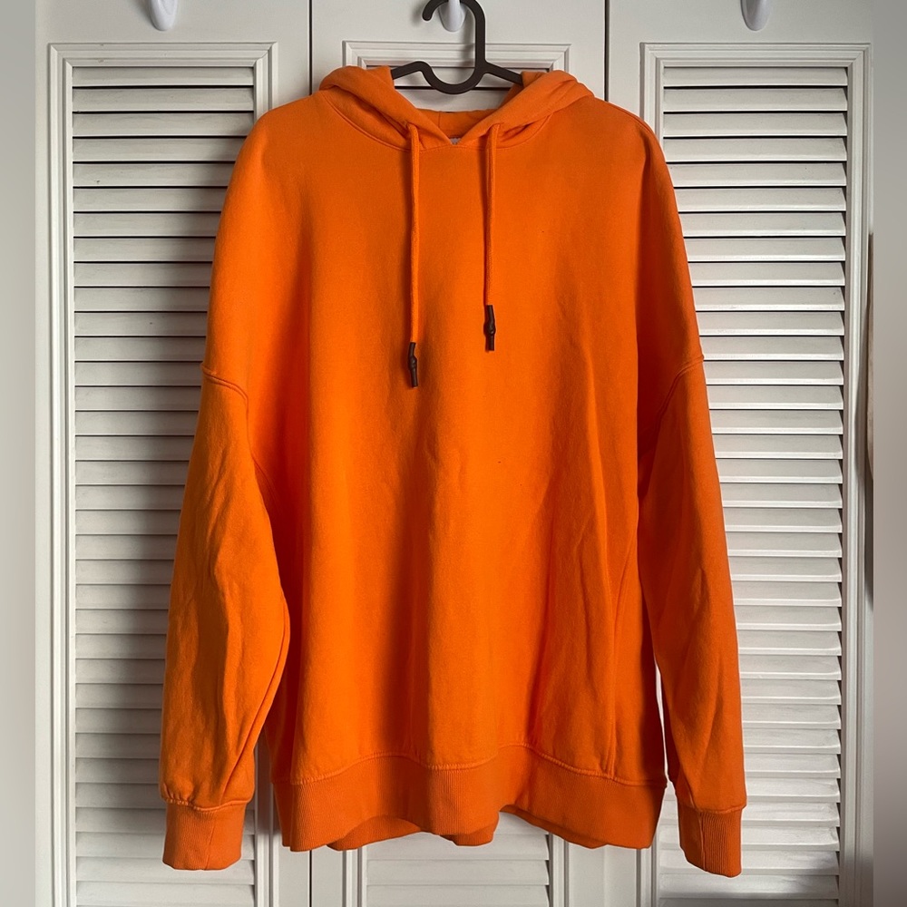 H&M Orange Hoodie with black hardware detail